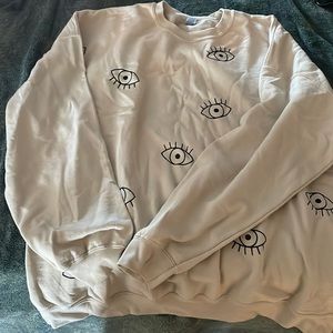Evil eye crew neck